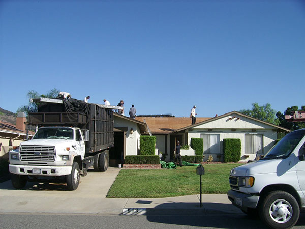 A white truck parked at a house